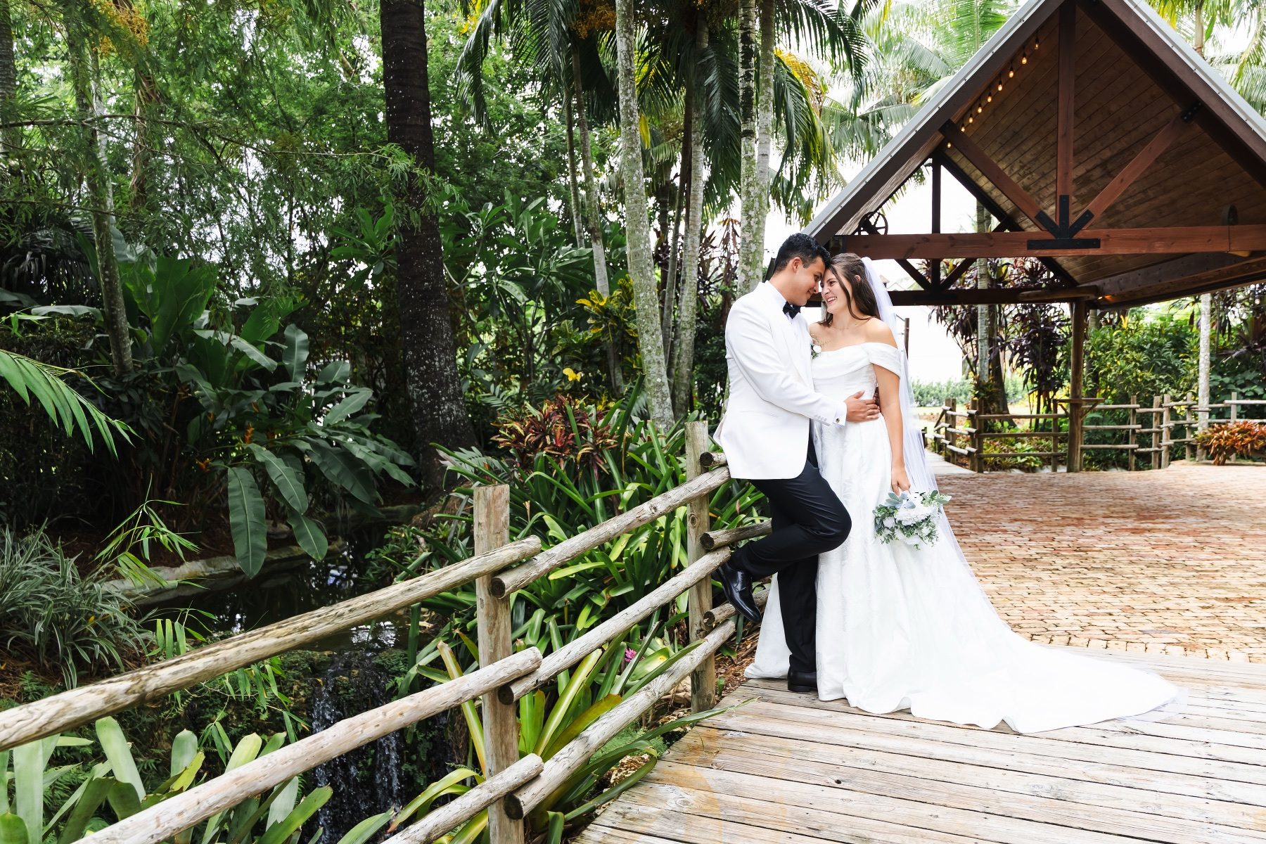 Leah & Jose photographed in the gardens at The Arbor Estate